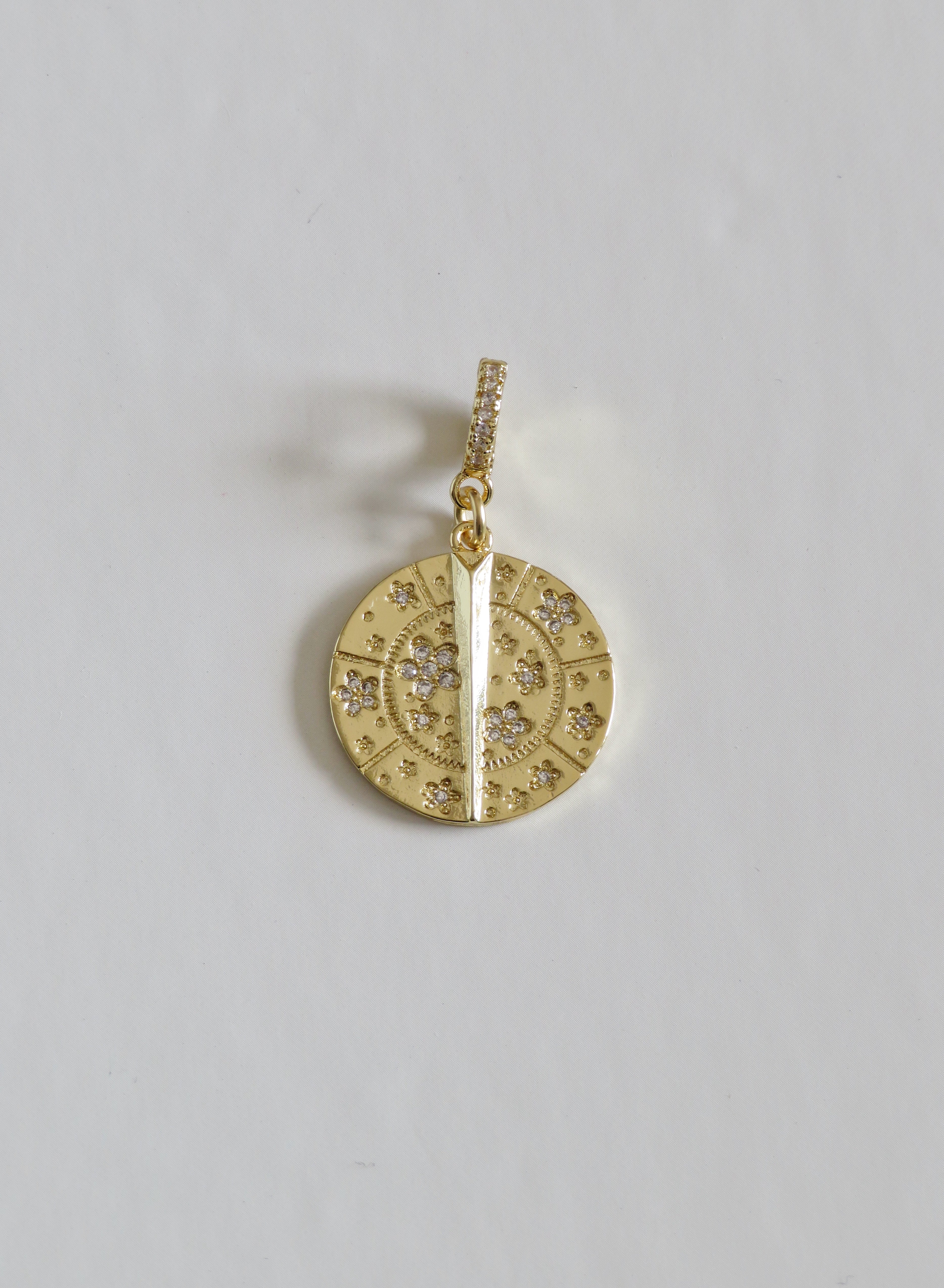 Blossoms with Thorn Sundial Charm on Diamond Hinged Clasp